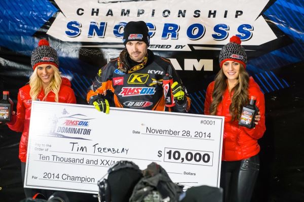 Tim Tremblay with the $10,000 winner’s check after beating all challengers in the head-to- head Dominator race.