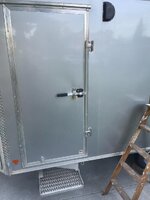 snow pro trailer man door w lock bar .jpg